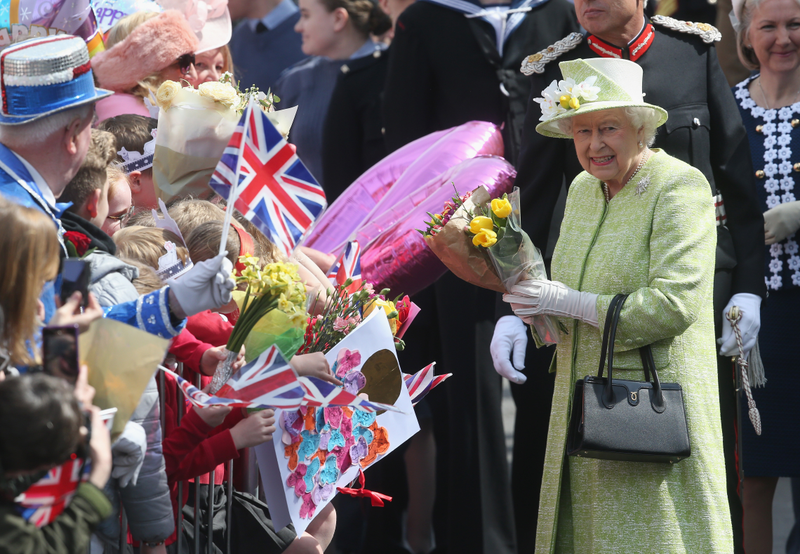 Illustration for article titled Enthusiasts Greet Queen Elizabeth II on Her 90th Birthday